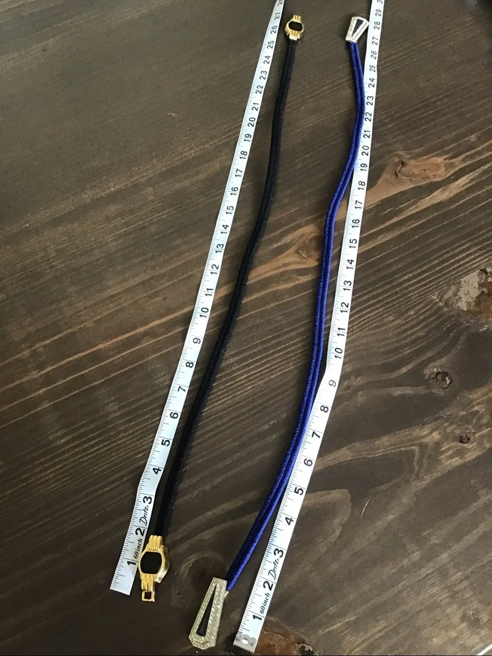 Vintage skinny elastic cord cinch belts.